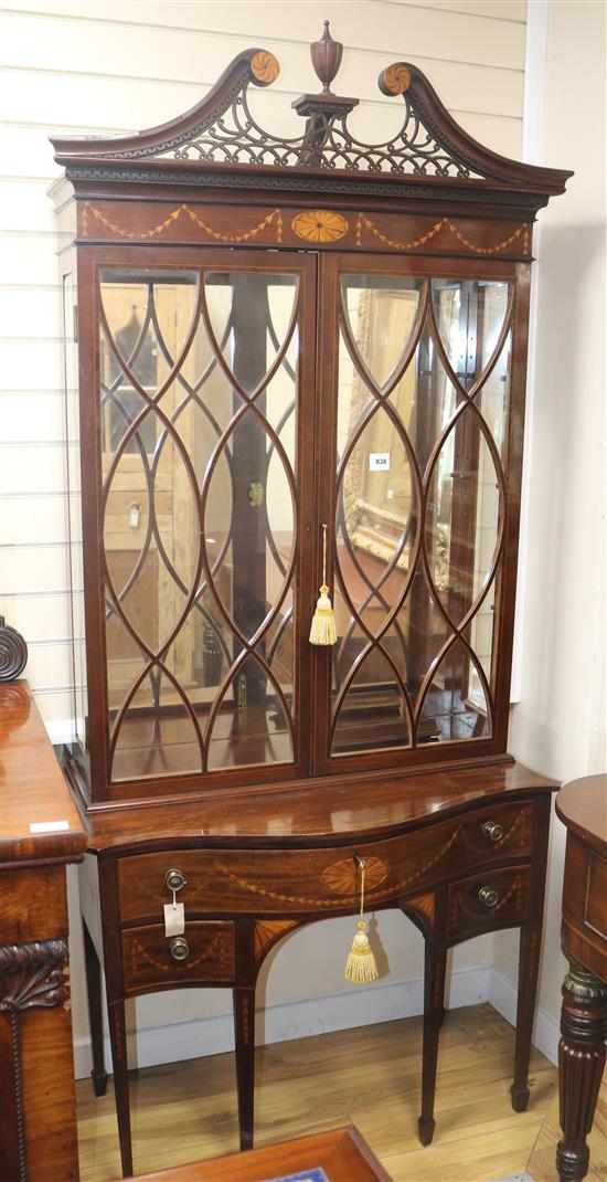 An Edwardian Sheraton Revival marquetry inlaid mahogany bookcase, W.3ft 3in. D.1ft 6in. H.7ft 4in.